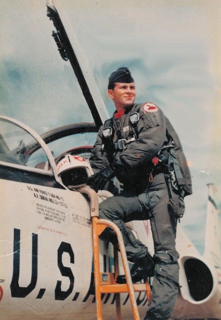 US military wearing a bomber jacket.