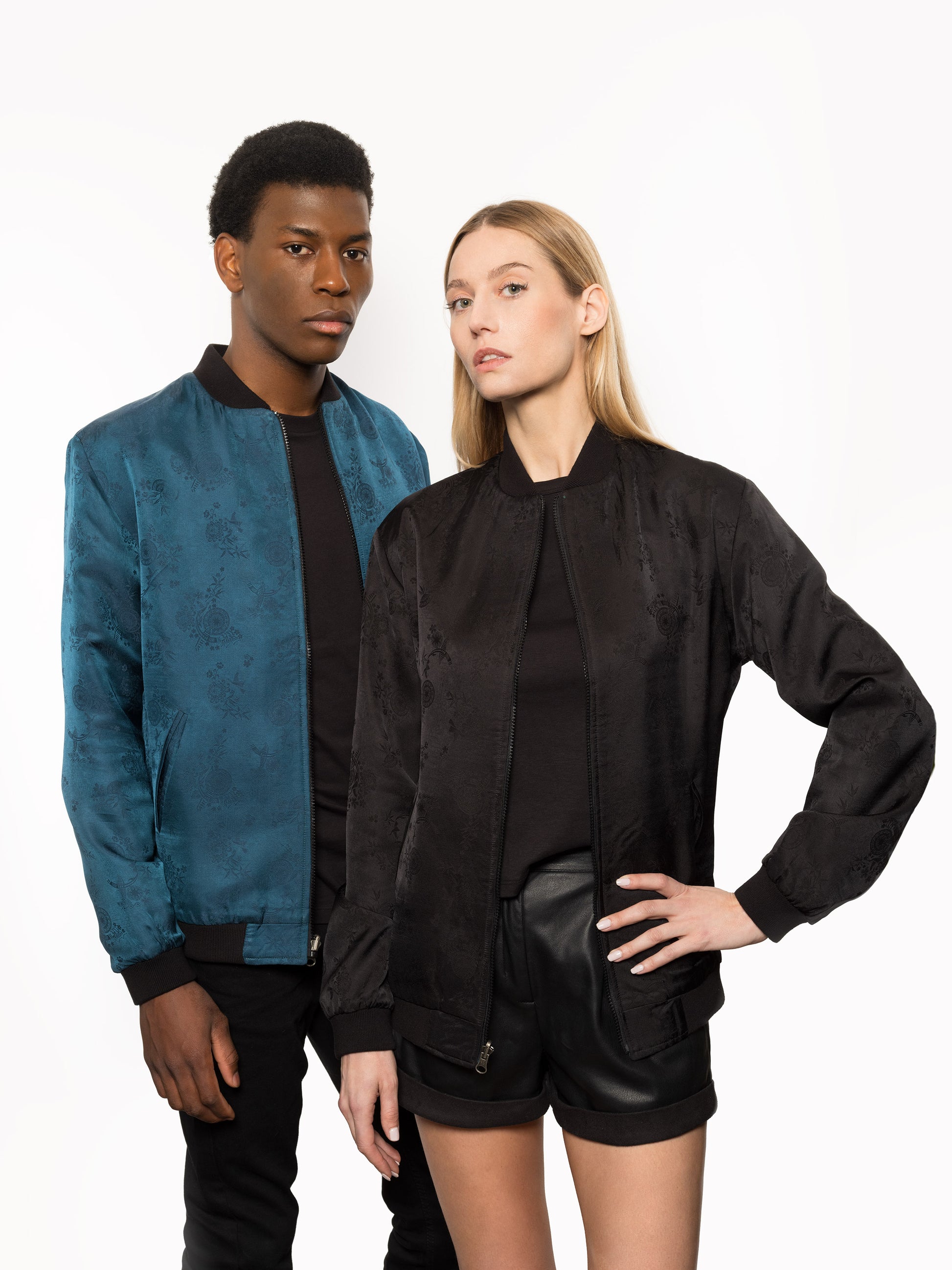 "Introducing Kaelu's exclusive 'DJINN' silk bomber jacket, numbered 1 to 20. Meticulously crafted in Vietnam using authentic Vietnamese silk, this reversible marvel features a refined blend of green and black, exuding subtle classiness. Unlike the bold Japanese sukajan, this piece offers understated luxury with a nod to urban sophistication."